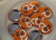 Group of open access lapel buttons. 
