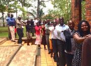 Ugandan libraries marching in crocodile format during a training ice-breaker.