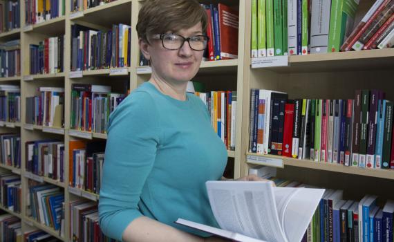 Barbara Szczepanska, library at Hogan Lovells, Warsaw Photo of Barbara Szczepanska in the library at Hogan Lovells