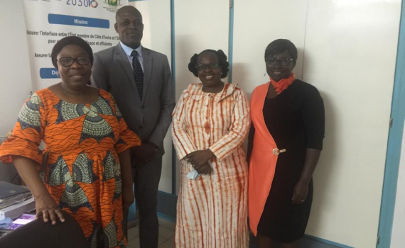 Left to right, Dr Soro Ngolo Aboudou's assistant; Dr Soro Ngolo Aboudou, Secretary General of the Ivorian National Commission for UNESCO; Cécile Coulibaly, EIFL Country Coordinator; Ouffouet Ahou Marie-Claire Allou, EIFL Copyright Coordinator.