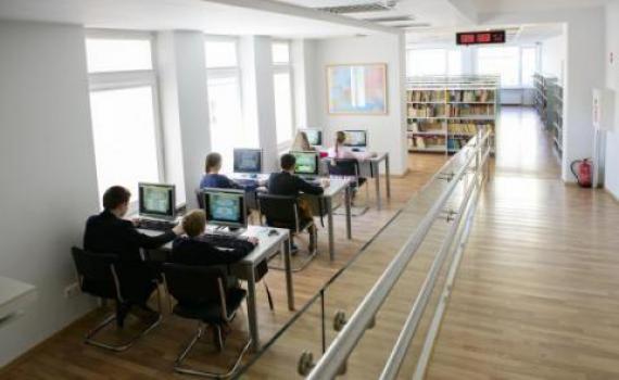Children in 'A. & M. Miskiniai' Public Library playing the library’s educational computer game, Issukis. Photo credit Gintare Zakarauskaite. Children in 'A. & M. Miskiniai' Public Library playing the library’s educational computer game, Issukis. Photo credit Gintare Zakarauskaite.