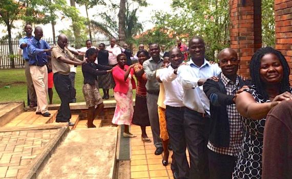 Ugandan libraries marching in crocodile format during a training ice-breaker.